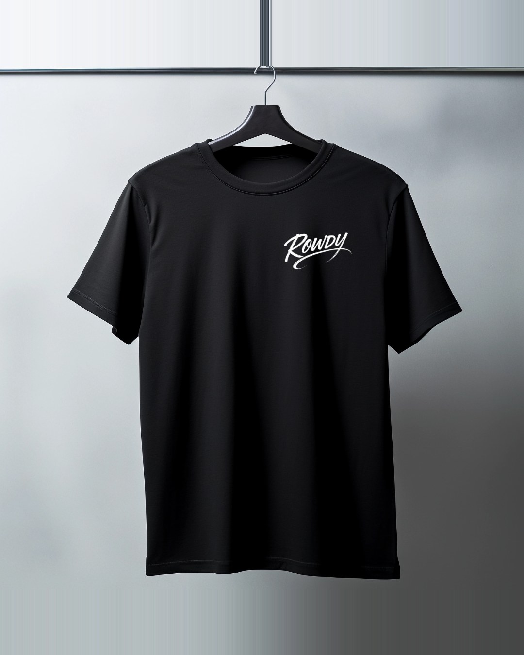 The black Rowdy tee on a hanger, small white script print on the left chest